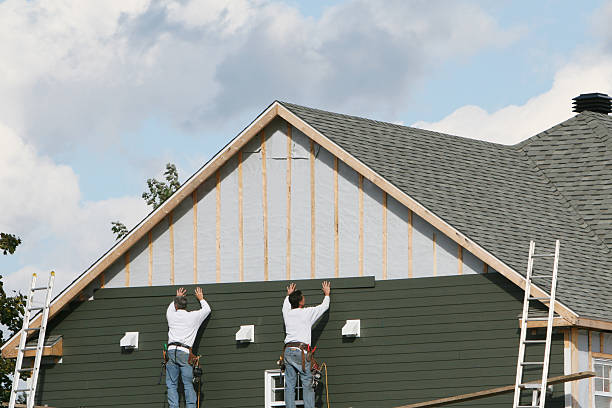Professional Siding Installation technician working in Haywood, VA